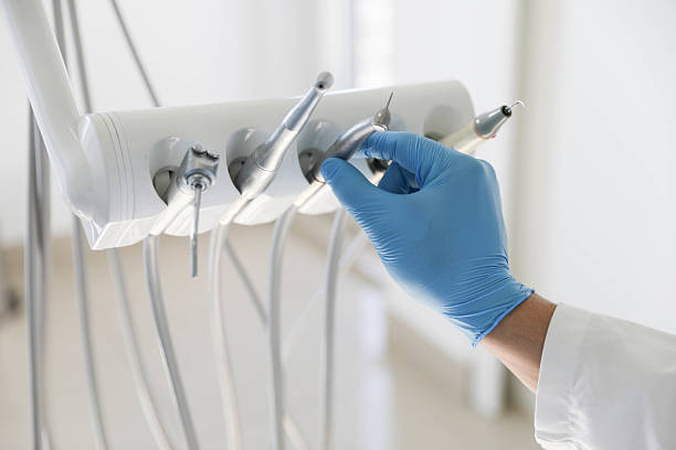Professional Tooth Extraction technician working in Cashion, OK